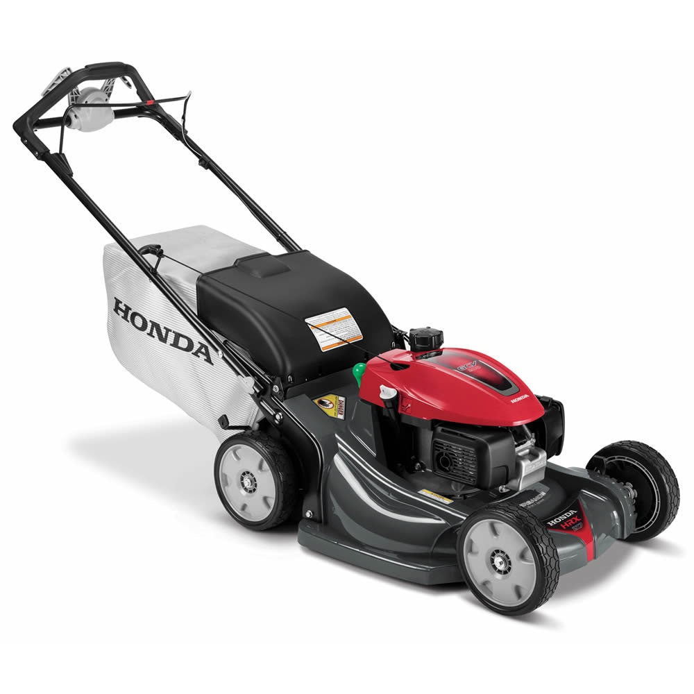 Honda HRX217K5VKA 21-inch gas lawn mower with 187cc engine and 4-in-1 Versamow system, shown in a green yard setting.