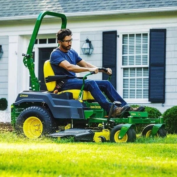 VIRLALA John Deere Z530M 54-inch zero-turn riding lawn mower with 24 HP engine and hydrostatic transmission, ready for lawn care.